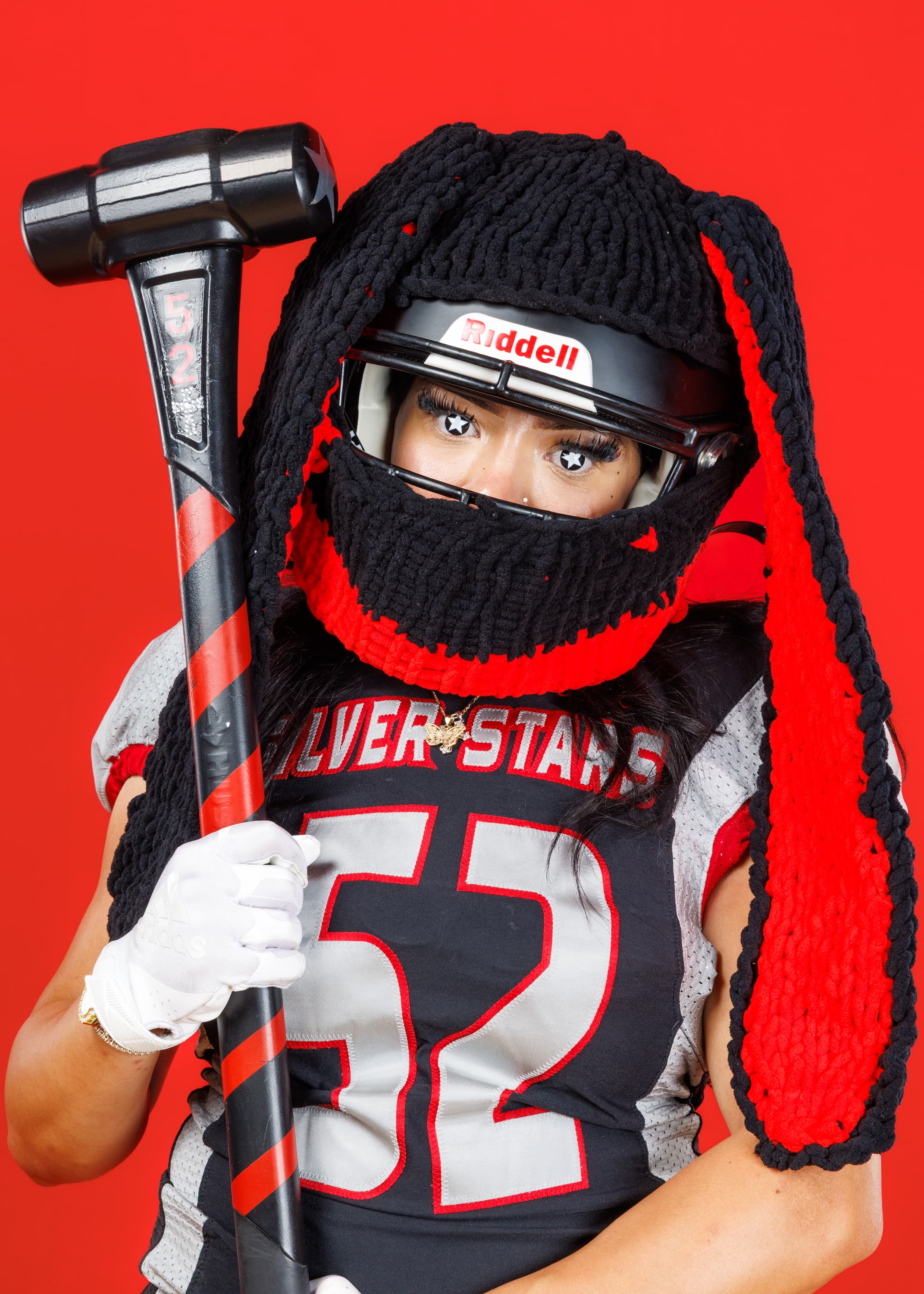 Sideline Imagery media day football portrait on a red backdrop